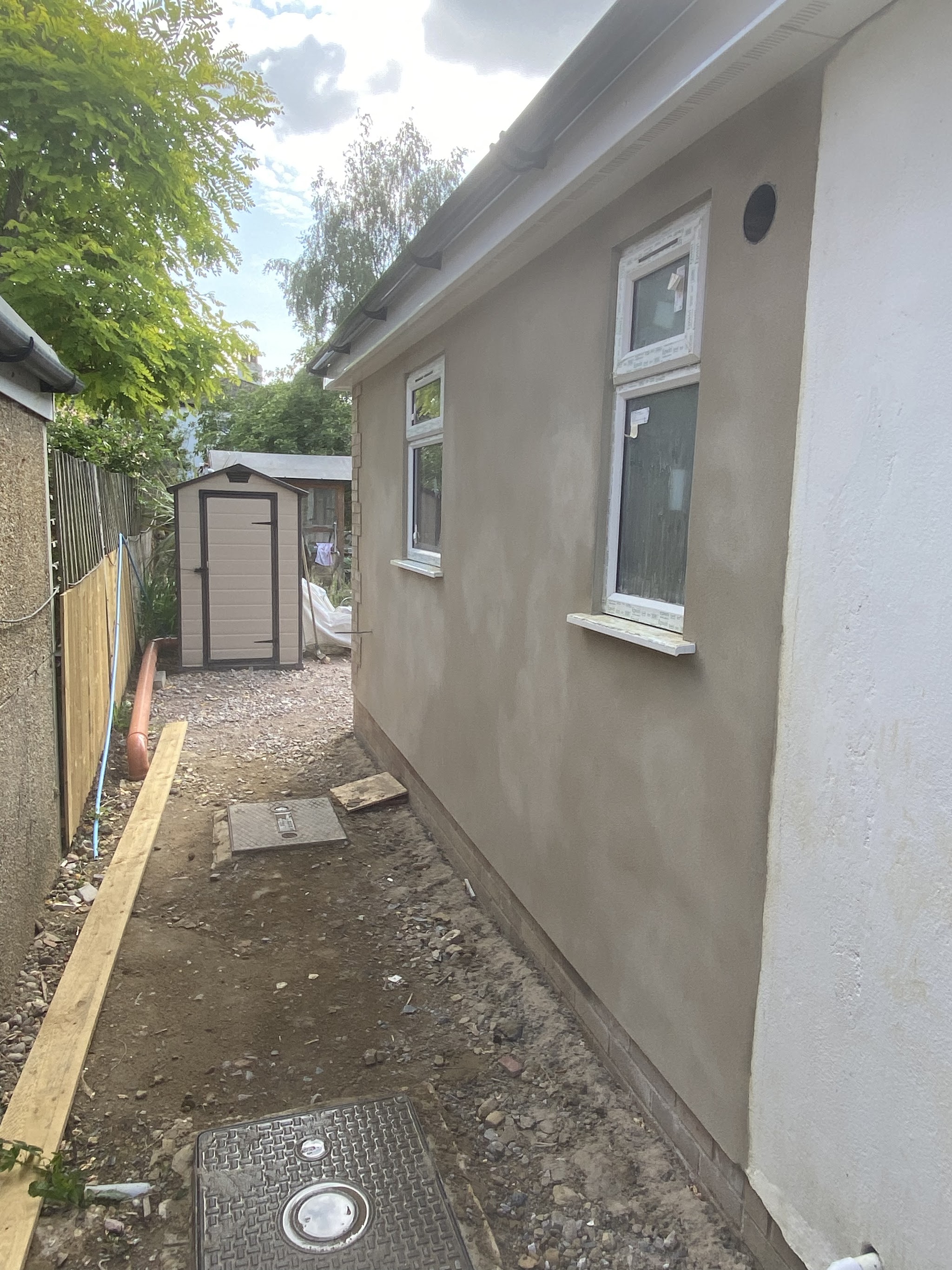 Exterior wall of a single-storey building, freshly finished