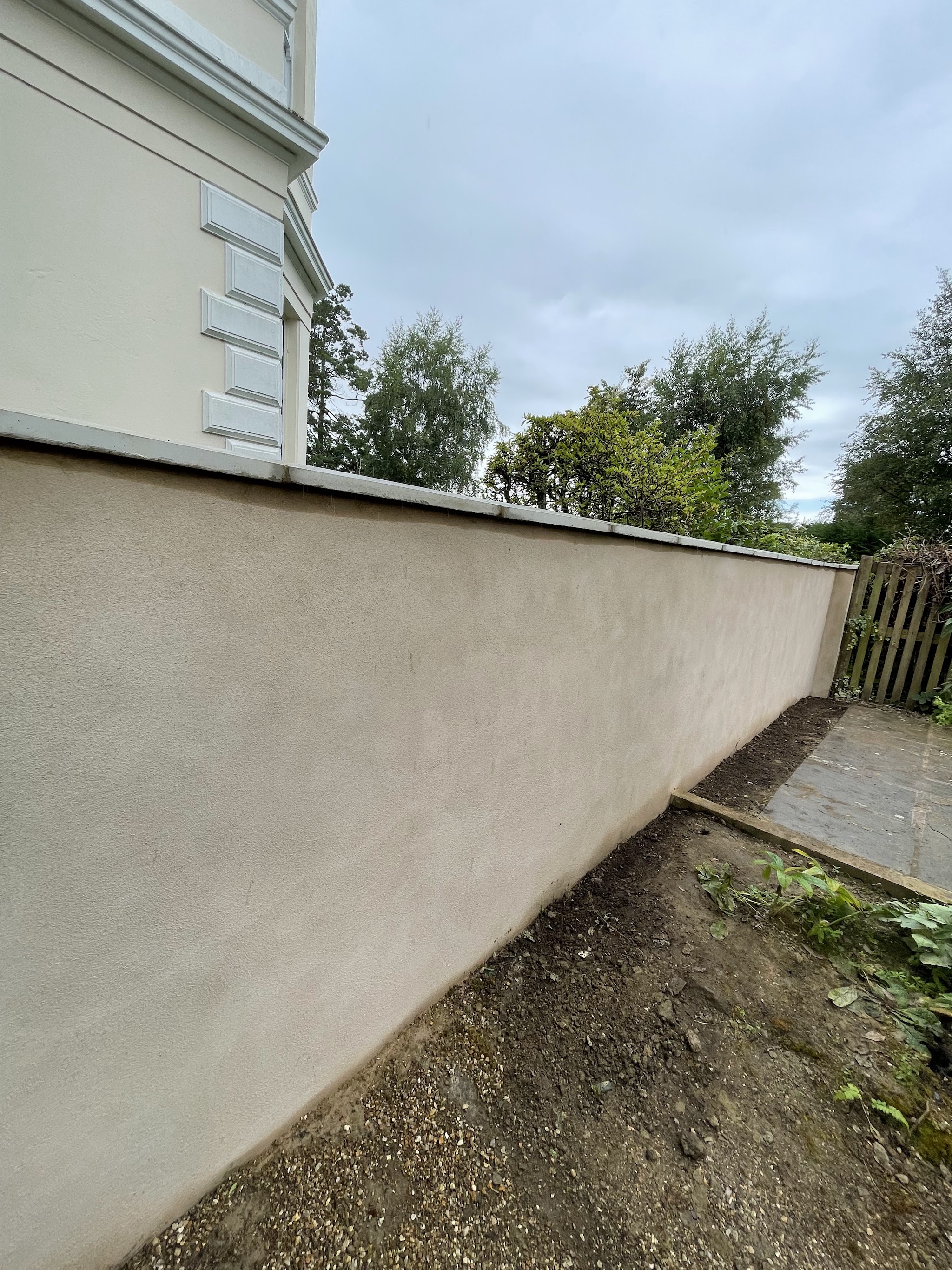 Garden wall finished alongside a period house